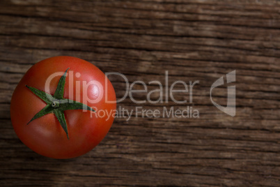 Tomato on wooden table