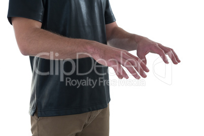 Mid section man gesturing against white background