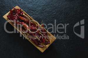 Chili pepper in wooden tray