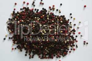 Black pepper on white background