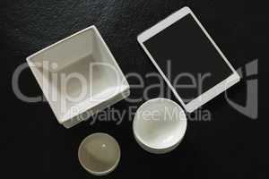 Various types of plastic bowl with digital tablet