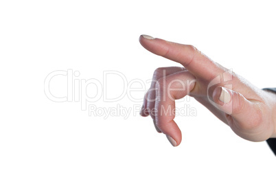 Cropped image of finger touching imaginary screen