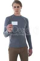 Businessman reading card against white background