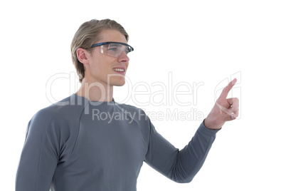 Smiling businessman gesturing while wearing smart glasses