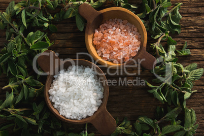 Salts in a bowl with herbs