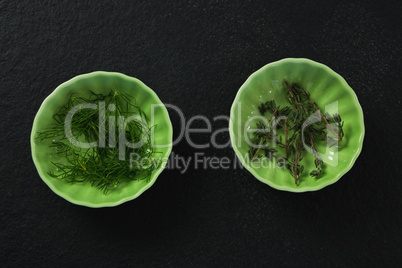 Dill and rosemary in bowl