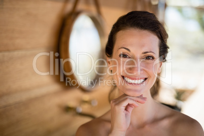 Portrait of beautiful woman in cottage
