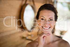 Portrait of beautiful woman in cottage