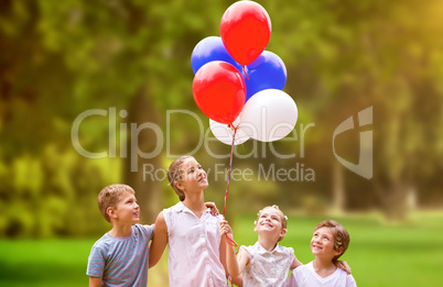 Composite image of girl with friends holding colorful balloons