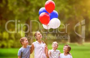 Composite image of girl with friends holding colorful balloons