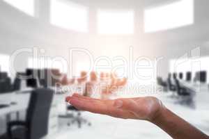 Composite image of hand of man pretending to hold an invisible object