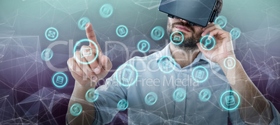 Composite image of man pointing while using oculus rift headset