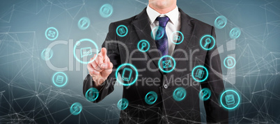 Composite image of businessman standing and pointing