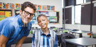 Composite image of portrait of smiling male teacher with student