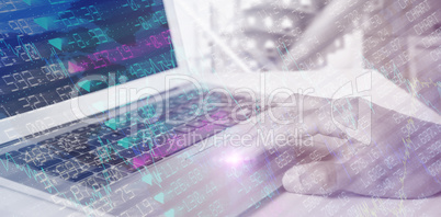 Composite image of hand of executive using laptop