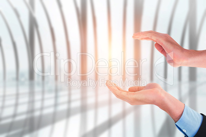 Composite image of close up of businessman with empty hand open