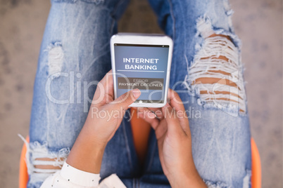 Composite image of internet banking text on mobile display