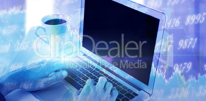 Composite image of cropped hands of businessman using laptop while having coffee