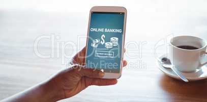 Composite image of online banking text on blue mobile display