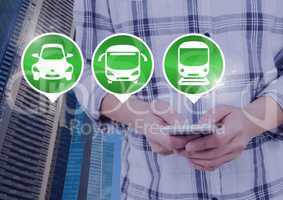 Transport icons and hands holding phone in city