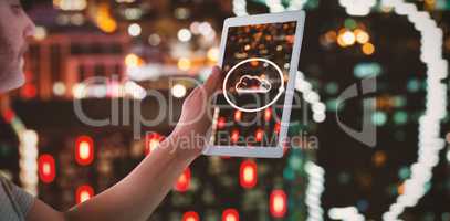 Composite image of man holding digital tablet