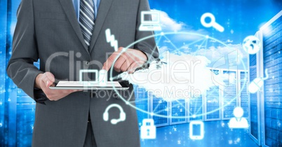 Business man holding a tablet and graphics in server room