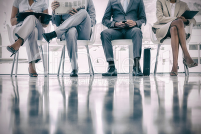 Group of well dressed business people waiting