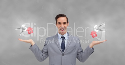 Business man holding keys