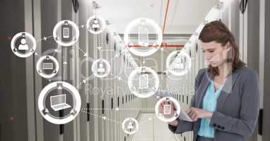 Business woman holding a tablet and graphics in server room