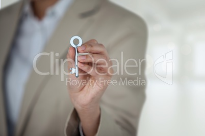 Business woman holding keys