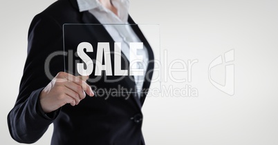 Business woman holding a glass with sale text