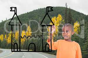 Boy drawing a castle on the road