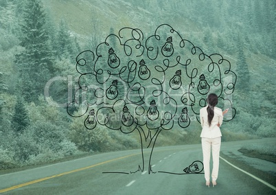 Business woman drawing a tree  on the road