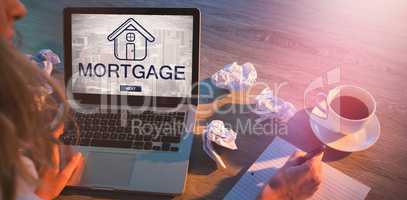 Composite image of digital image of mortgage text and cityscape