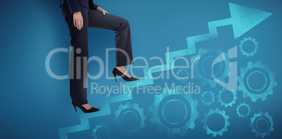 Composite image of conceptual image of businesswoman in heels climbing steps