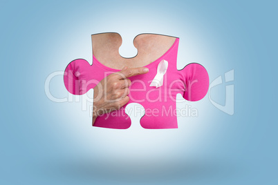 Composite image of woman in pink outfits showing ribbon for breast cancer awareness