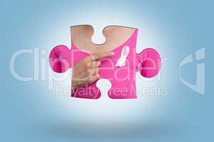 Composite image of woman in pink outfits showing ribbon for breast cancer awareness