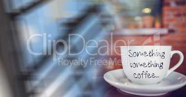 White coffee cup with text and blurry window transition