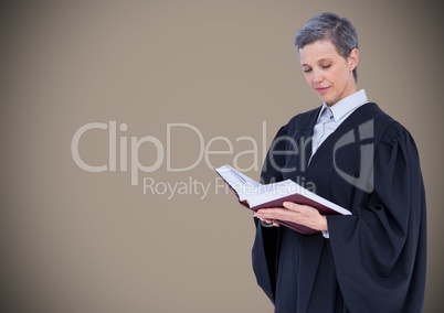 Female judge reading against brown background