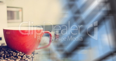 Red coffee cup with beans and blurry window transition