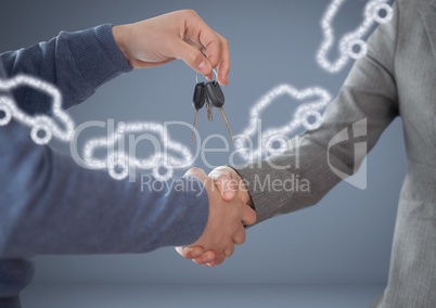 Hands Holding key with cars in front of vignette with handshake