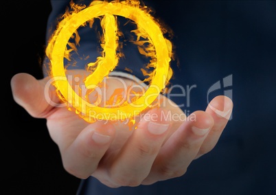 hand with clock fire icon over. Black background