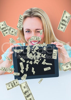 texting money. Happy woman with tablet, money coming up from tablet