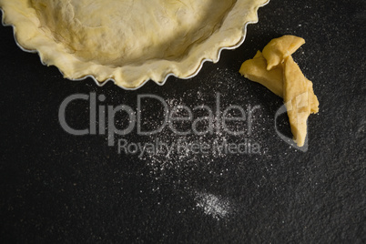 Cropped image of pastry dough in backing pan
