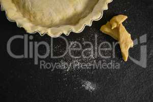 Cropped image of pastry dough in backing pan