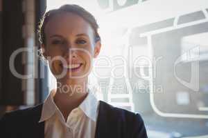 Portrait of happy owner in cafe