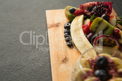 Various fruits on chopping board