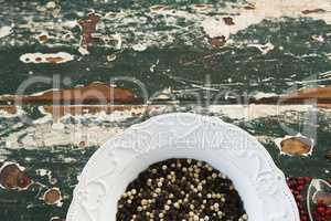 Mix peppercorns on wooden table