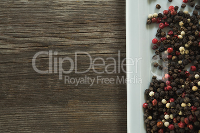 Mix peppercorns in tray