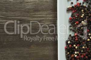 Mix peppercorns in tray